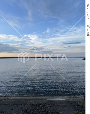 Tranquil Waters Under a Vibrant Sky Tranquil Waters Under a Vibrant Sky 120589670