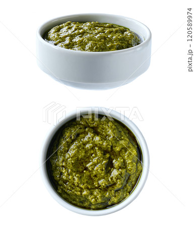 Traditional italian sauce pesto in a ceramic bowl isolated on white background. 120589974