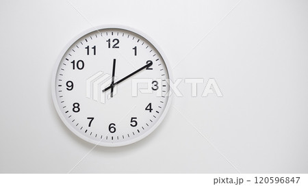Clean White Clock at 12.10 or 00.10 on Minimalist White Background - Ideal for Time Concepts and Modern Design Clean White Clock at 12.10 or 00.10 on Minimalist White Background - Ideal for Time Concepts and Modern Design 120596847