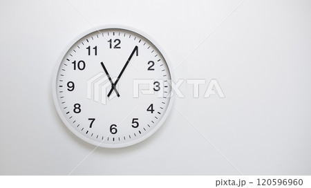 Clean White Clock at 11.05 or 23.05 on Minimalist White Background - Ideal for Time Concepts and Modern Design Clean White Clock at 11.05 or 23.05 on Minimalist White Background - Ideal for Time Concepts and Modern Design 120596960