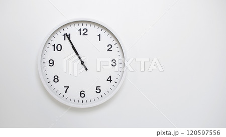 Clean White Clock at 10.55 or 22.55 on Minimalist White Background - Ideal for Time Concepts and Modern Design Clean White Clock at 10.55 or 22.55 on Minimalist White Background - Ideal for Time Concepts and Modern Design 120597556