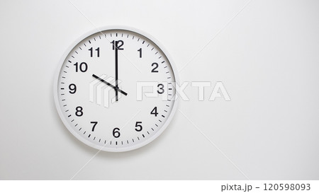 Clean White Clock at 10.00 or 22.00 on Minimalist White Background - Ideal for Time Concepts and Modern Design Clean White Clock at 10.00 or 22.00 on Minimalist White Background - Ideal for Time Concepts and Modern Design 120598093