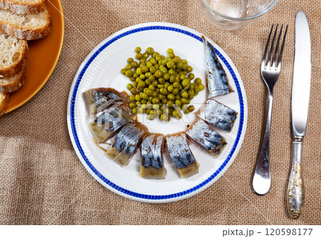 Sliced mackerel fish served with peas Sliced mackerel fish served with peas 120598177