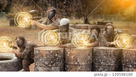 Paintball players of opposite teams in shootout Paintball players of opposite teams in shootout 120598180