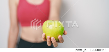 woman hand hold green Apple, happy female fitness choose fruit is Healthy food. Dieting control, Weight loss, Obesity, eating lifestyle and nutrition concepts woman hand hold green Apple, happy female fitness choose fruit is Healthy food. Dieting control, Weight loss, Obesity, eating lifestyle and nutrition concepts 120600942