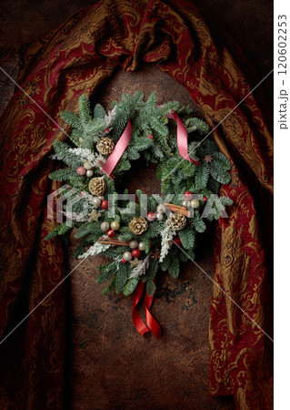 Christmas wreath on a brown vintage background. 120602253