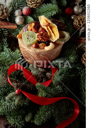 Dried fruits and Christmas wreath. Dried fruits and Christmas wreath. 120602260