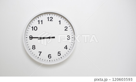 Clean White Clock at 08.45 or 20.45 on Minimalist White Background - Ideal for Time Concepts and Modern Design Clean White Clock at 08.45 or 20.45 on Minimalist White Background - Ideal for Time Concepts and Modern Design 120603593