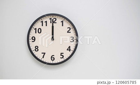 Classic Black-Edged Clock on White Background at 12.00/00.00/24.00 - Perfect for Time Management and Text Space 120605785