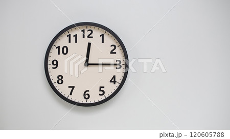 Classic Black-Edged Clock on White Background at 12.15/00.15 - Perfect for Time Management and Text Space Classic Black-Edged Clock on White Background at 12.15/00.15 - Perfect for Time Management and Text Space 120605788