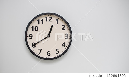 Classic Black-Edged Clock on White Background at 12.40/00.40 - Perfect for Time Management and Text Space Classic Black-Edged Clock on White Background at 12.40/00.40 - Perfect for Time Management and Text Space 120605793