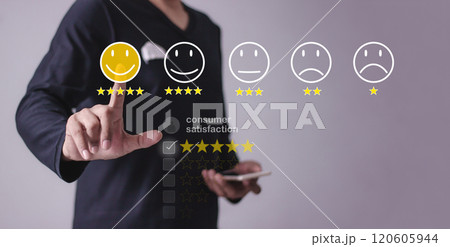 Young Man with smartphone mobile hand touching five star to review and give 5 stars Young Man with smartphone mobile hand touching five star to review and give 5 stars 120605944