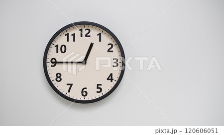 Classic Black-Edged Clock on White Background at 12.45/00.45 - Perfect for Time Management and Text Space 120606051