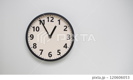 Classic Black-Edged Clock on White Background at 12.55/00.55 - Perfect for Time Management and Text Space Classic Black-Edged Clock on White Background at 12.55/00.55 - Perfect for Time Management and Text Space 120606053