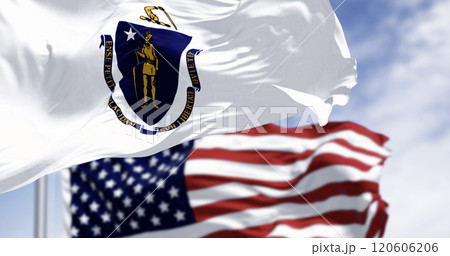 The flags of Massachusetts and the United States waving in the wind on a clear day The flags of Massachusetts and the United States waving in the wind on a clear day 120606206