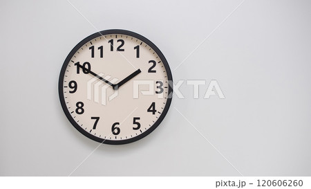 Classic Black-Edged Clock on White Background at 13.50/01.50 - Perfect for Time Management and Text Space Classic Black-Edged Clock on White Background at 13.50/01.50 - Perfect for Time Management and Text Space 120606260