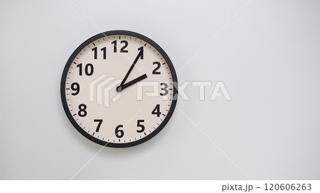 Classic Black-Edged Clock on White Background at 14.05/02.05 - Perfect for Time Management and Text Space 120606263