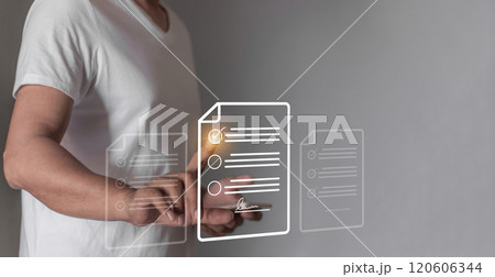 Young man with smartphone mobile hand touching to sign a business contract online 120606344