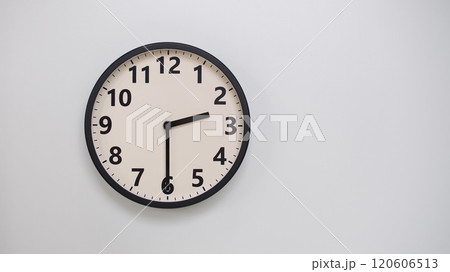 Classic Black-Edged Clock on White Background at 14.30/02.30 - Perfect for Time Management and Text Space 120606513