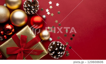 Red and Gold Christmas Arrangement with Gift Box and Baubles on Red Background. Elegant, Festive Christmas Banner, Template, Copy Space, Social Media Post Red and Gold Christmas Arrangement with Gift Box and Baubles on Red Background. Elegant, Festive Christmas Banner, Template, Copy Space, Social Media Post 120608606