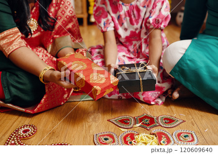 Exchanging Gifts During Vibrant Cultural Celebration Exchanging Gifts During Vibrant Cultural Celebration 120609640
