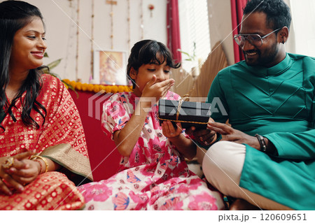 Celebrating Special Occasion with Family and Gifts 120609651