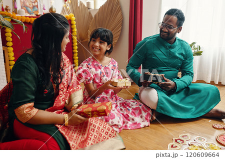 Celebrating Festivities with Family and Exchanging Gifts Celebrating Festivities with Family and Exchanging Gifts 120609664
