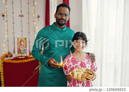 Celebrating Traditional Festival with Family Member 120609833