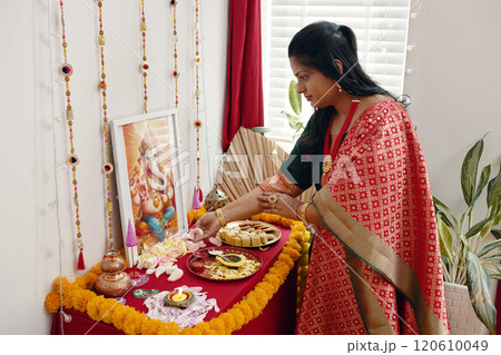 Celebrating Indian Festival with Traditional Decor and Food Celebrating Indian Festival with Traditional Decor and Food 120610049