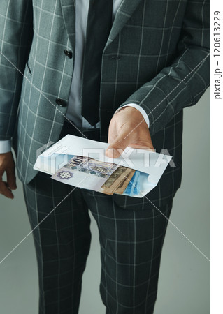businessman has an envelope with forints businessman has an envelope with forints 120613229