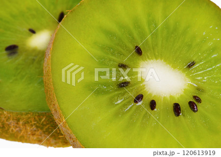 Two pieces of kiwi isolated on a white background. Two pieces of kiwi isolated on a white background. 120613919