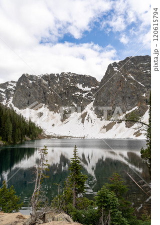 Snow-capped Mountains and Reflective Lake in a Stunning Alpine Landscape. 120615794