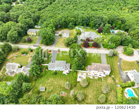 Aerial view of Suburban neighborhood Norfolk County, Massachusetts with green forest, with big villa Aerial view of Suburban neighborhood Norfolk County, Massachusetts with green forest, with big villa 120621430