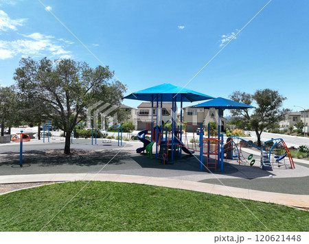 Colorful children playground activities in community public park  120621448
