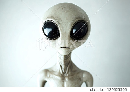 Grey alien posing on white background, extraterrestrial life concept Grey alien posing on white background, extraterrestrial life concept 120623396
