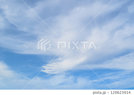 White clouds in a bright blue sky. The beauty of the nature	 120623914