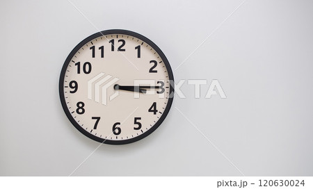 Classic Black-Edged Clock on White Background at 15.15/03.15 - Perfect for Time Management and Text Space Classic Black-Edged Clock on White Background at 15.15/03.15 - Perfect for Time Management and Text Space 120630024