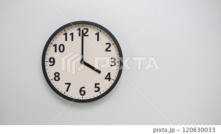 Classic Black-Edged Clock on White Background at 16.00/04.00 - Perfect for Time Management and Text Space 120630033