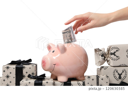 PNG, Christmas piggy bank, with festive decorations and gifts, isolated on white background. 120630385