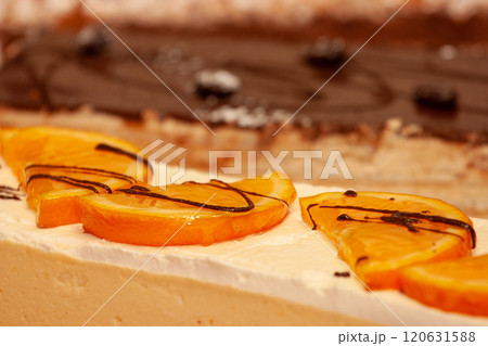 This is a Delicious Citrus Dessert featuring Orange Slices beautifully paired with Chocolate 120631588