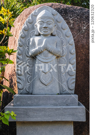 Buddhist statue of deity in park at pagoda at Cham Towers in Nha Trang in Vietnam 120632320