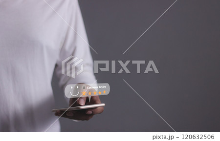 Customer Review, Young Man hand using smartphone mobile with five star to review and give 5 stars Customer Review, Young Man hand using smartphone mobile with five star to review and give 5 stars 120632506