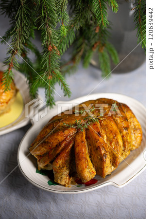 Baked chicken fillet on the bone, an alternative to holiday turkey for the holidays 120639442
