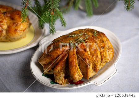 Baked chicken fillet on the bone, an alternative to holiday turkey for the holidays 120639443