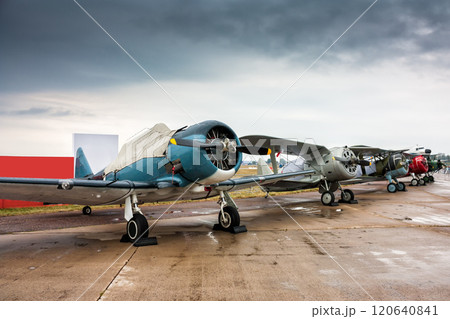 Retro airplanes in the parking lot on a cloudy day 120640841