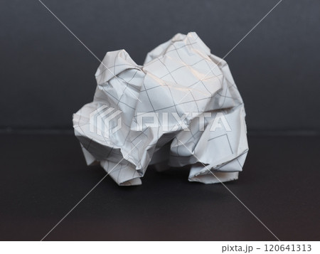 white paper ball over dark gray background white paper ball over dark gray background 120641313