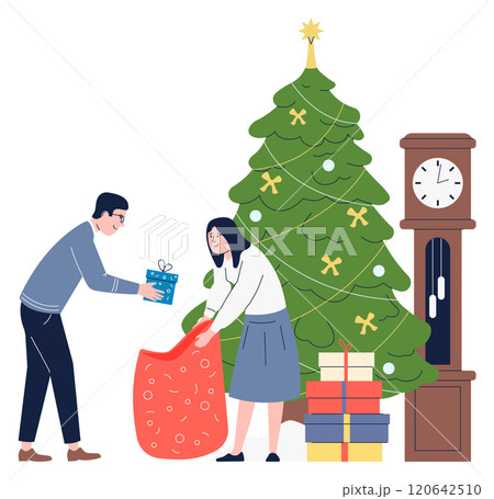 A man and a woman are opening a Christmas present 120642510