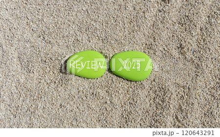Planning review 2025 new year symbol. Concept words Review 2025 on beautiful green stones. Beautiful sand sea beach background. Business review 2025 new year concept. Copy space. Planning review 2025 new year symbol. Concept words Review 2025 on beautiful green stones. Beautiful sand sea beach background. Business review 2025 new year concept. Copy space. 120643291