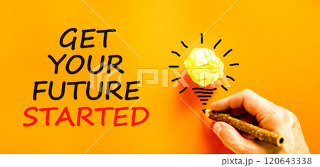 Get your future started symbol. Concept words Get your future started on beautiful orange paper. Beautiful orange background. Businessman hand. Business get your future started concept. Copy space. Get your future started symbol. Concept words Get your future started on beautiful orange paper. Beautiful orange background. Businessman hand. Business get your future started concept. Copy space. 120643338