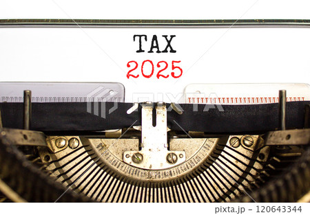 Planning tax 2025 new year symbol. Concept words Tax 2025 typed on beautiful old retro vintage typewriter. Beautiful white paper background. Business tax 2025 new year concept. Copy space. 120643344